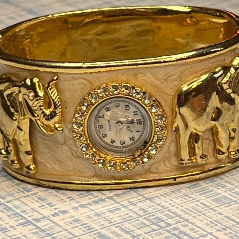 Beautiful Vintage Cannes Gold Elephant Bangle Watch with new battery